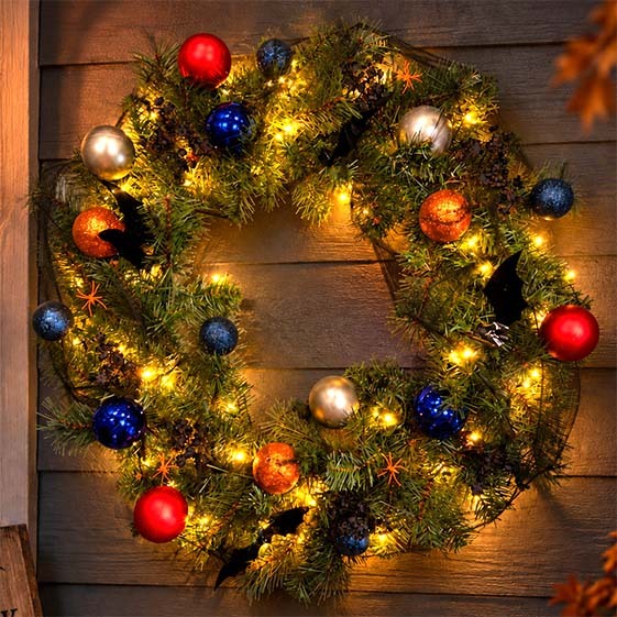 Illuminated Halloween wreath with bats, cobwebs, spiders and colourful ornaments